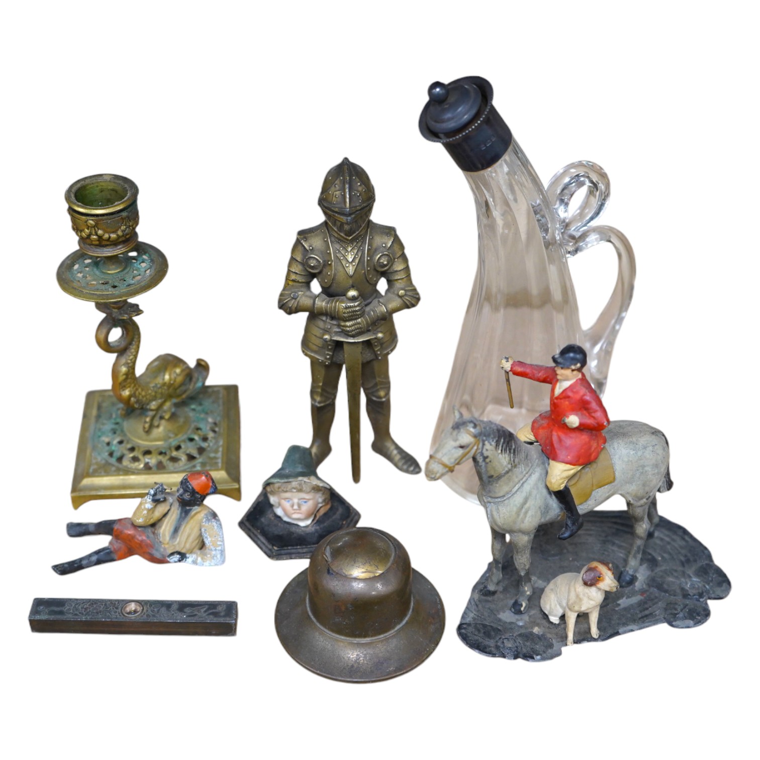 A group of spelter and other metalware items including a table lighter, inkwell etc (8). Condition - varies